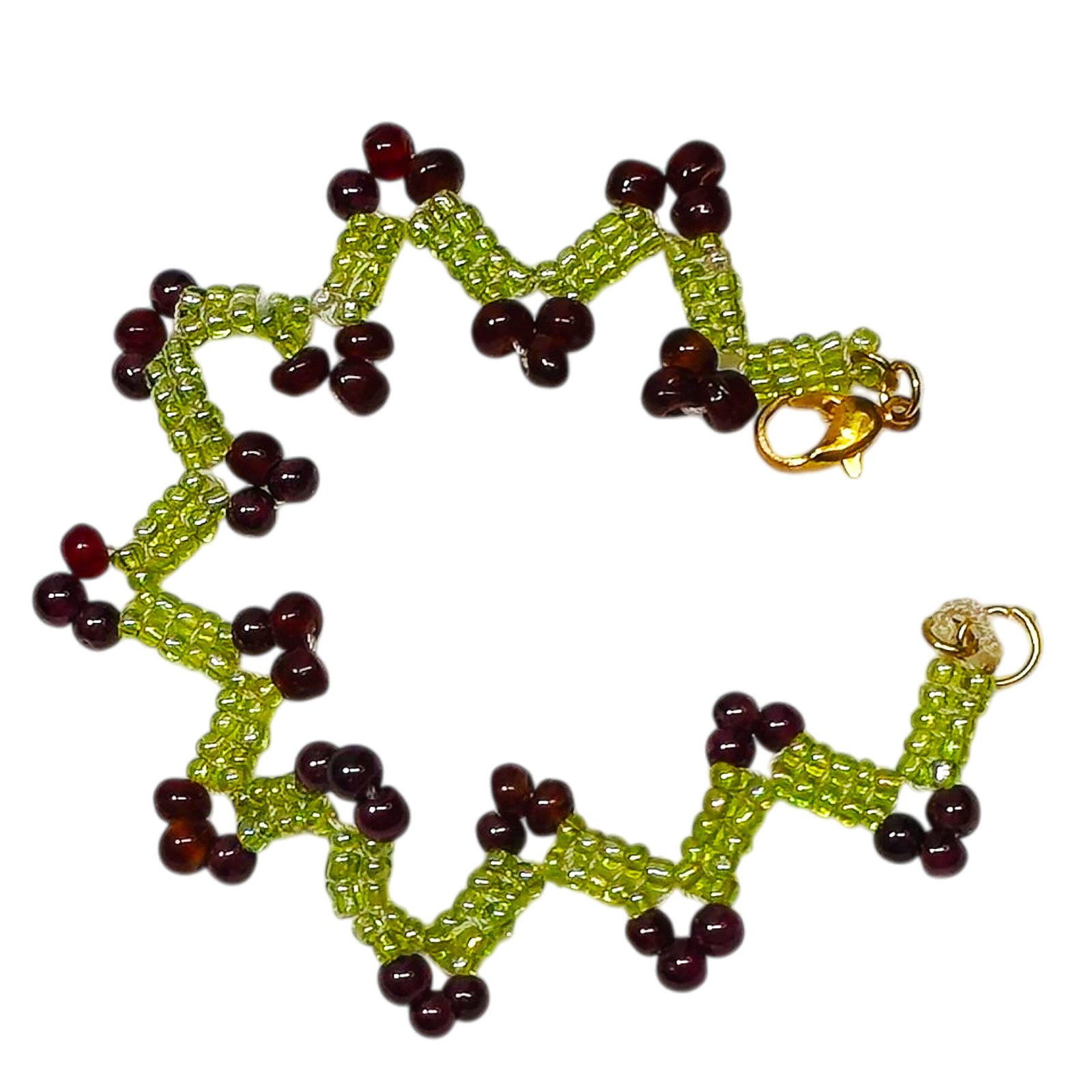 Grape Vine Beaded Bracelet featuring a lime green zig-zag seed bead pattern with clusters of burgundy beads on a white background.