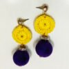 Handmade Velvet Sun dangle earrings featuring a yellow crochet circular disc and a purple velvet ball with a rhinestone spacer on a white background.