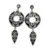 Aura Vintage Dangle Earrings featuring intricate silver-toned filigree, black enamel backgrounds, and faceted grey crystals in a teardrop silhouette.
