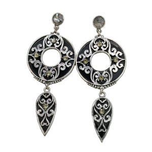 Aura Vintage Dangle Earrings featuring intricate silver-toned filigree, black enamel backgrounds, and faceted grey crystals in a teardrop silhouette.