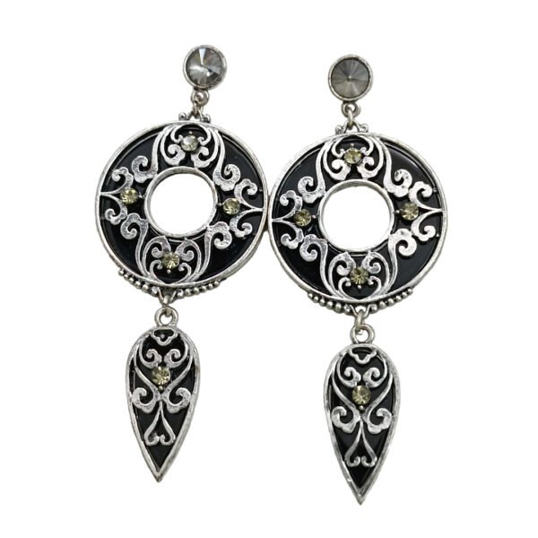 Aura Vintage Dangle Earrings featuring intricate silver-toned filigree, black enamel backgrounds, and faceted grey crystals in a teardrop silhouette.