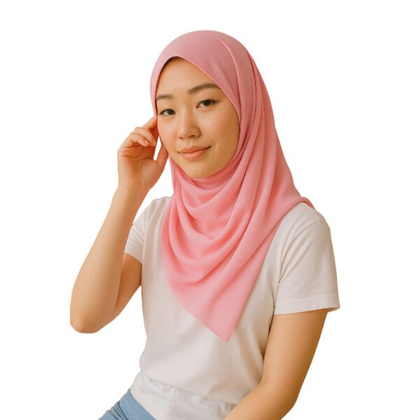 Heavy Chiffon Hijab in Blush Pink featuring a smooth, opaque drape on a smiling woman, showcasing the premium quality and elegant coverage of the fabric.