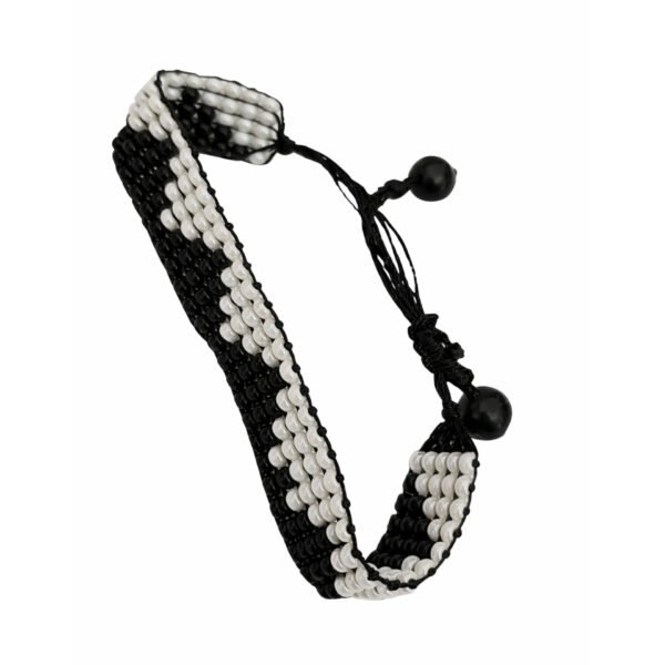 Black and white woven beaded bracelet with an adjustable pull-string closure.