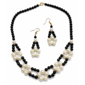 Classic Noir Pearl Necklace set featuring a 44.5 cm woven black and white bead necklace and matching 6.5 cm drop earrings with a gold clasp.