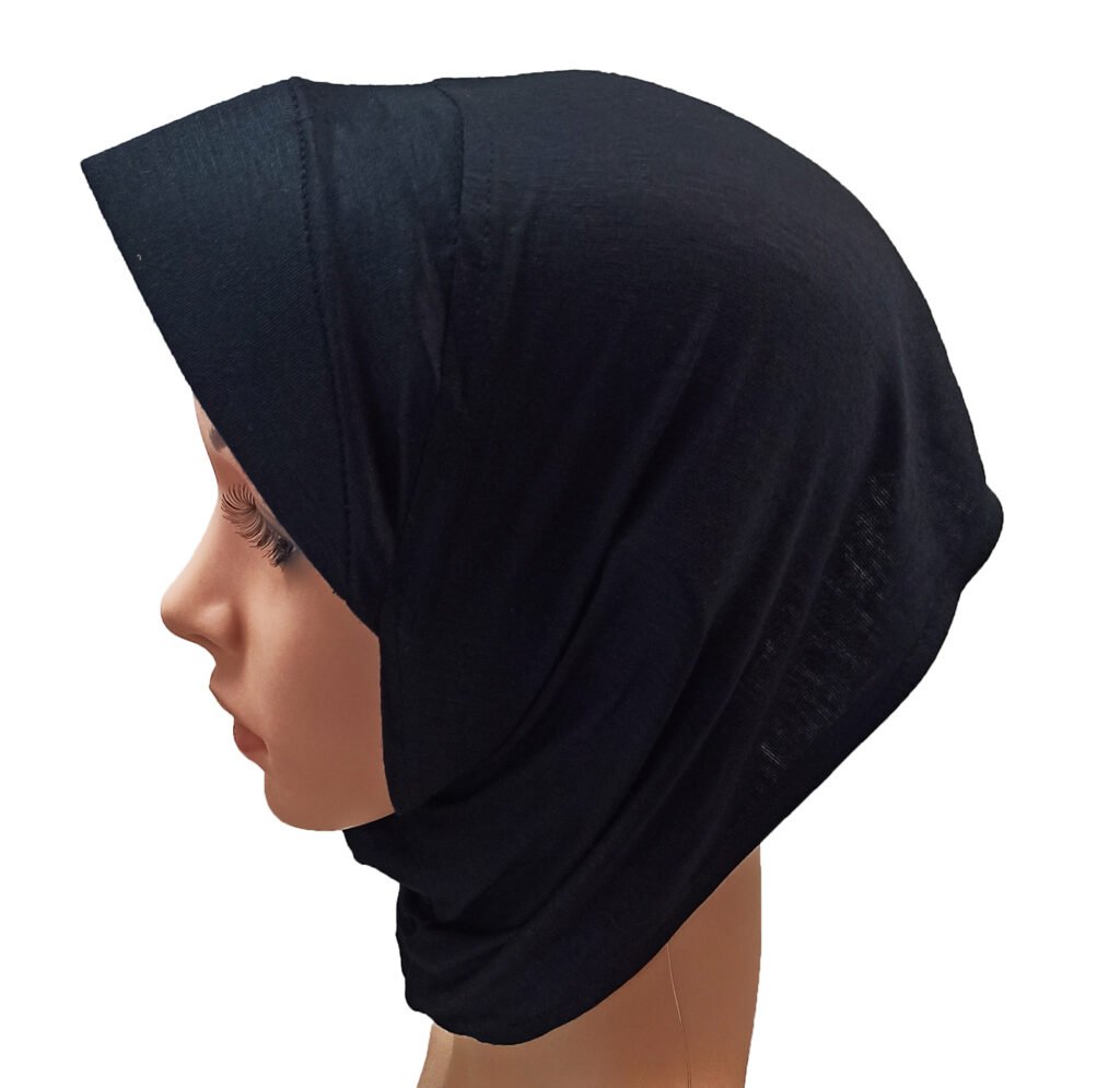 A black Canvas Under Scarf Cap made of stretchable jersey fabric shown on a mannequin head in a side profile view.