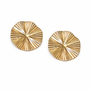 A pair of circular Golden Flare earrings featuring a wide, textured surface with a metallic, high-shine gold finish on a white background.