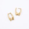 A pair of gold Urbane Hoops from the Cwen Collection featuring a sculpted U-shaped geometric design and a secure latch closure on a white background.