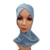 A front view of a mannequin wearing a light smoky blue NINJA CRISS CROSS Under Scarf showing the overlapping cross pattern at the forehead.