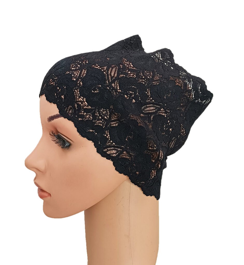 A side profile view of a mannequin wearing a stretchable Net Lace Tube Cap showing its intricate lace mesh pattern and smooth front edge.