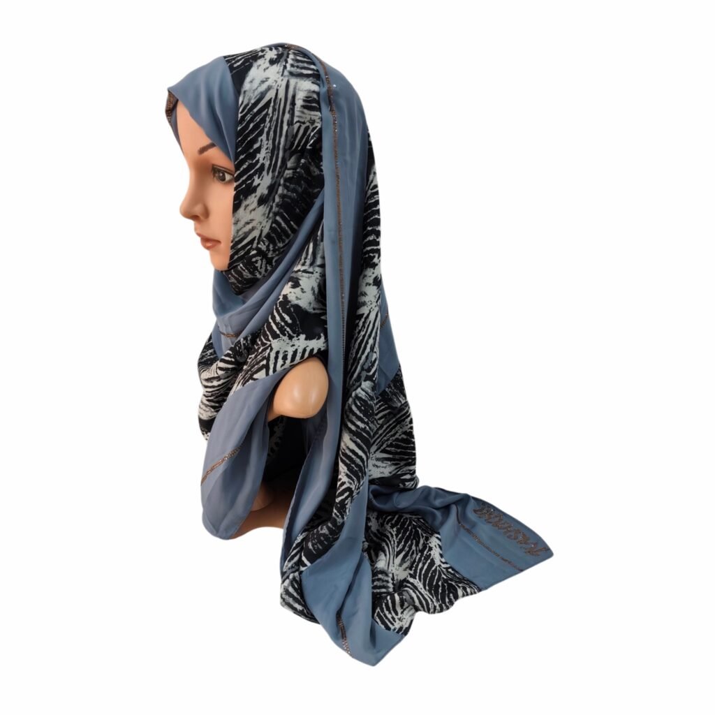 A mannequin wearing an authentic Kashkha Hijab Rhinestone Border showing its delicate crystal edge detailing and branded logo.