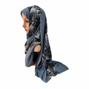 A mannequin wearing an authentic Kashkha Hijab Rhinestone Border showing its delicate crystal edge detailing and branded logo.